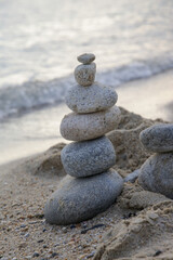 Fototapeta na wymiar Zen meditation stones on the beach