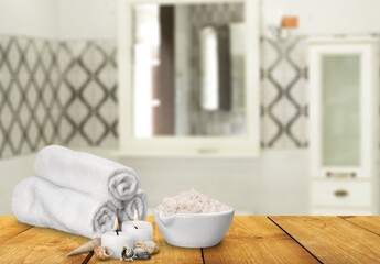 Fototapeta na wymiar Fresh clean towels on wooden table in bathroom.