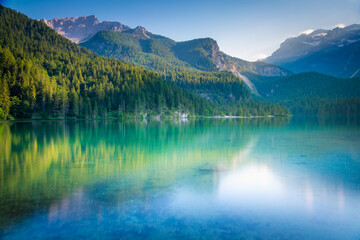 Fototapeta na wymiar Lake Tovel reflection symmetry in Trentino-Alto Adige, Dolomites, Italy