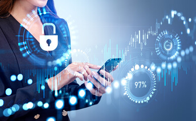 Businesswoman is formal wear typing on smartphone with digital interface