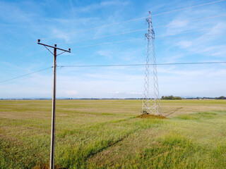 Electric pylon and pole. High voltage.  Electricity.