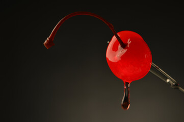 Maraschino cherry with goopy drip