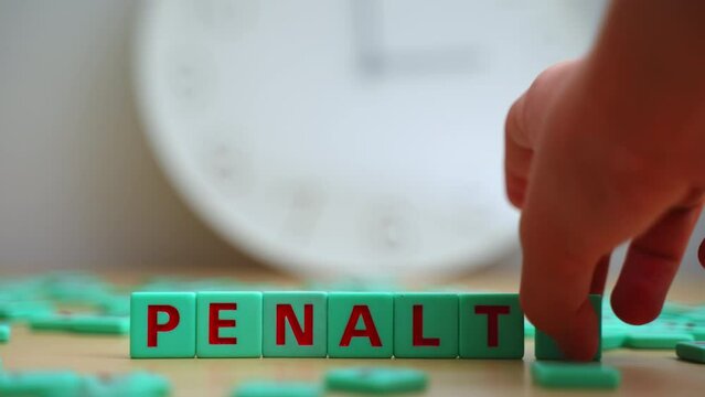 The word penalty. Small colorful cubes with letters on them. High quality 4k footage