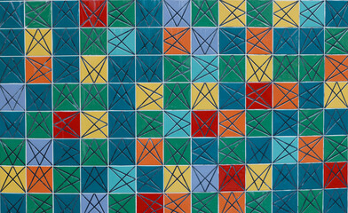 Multicolor tiles mosaic with arrows in different directions