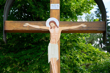 Byzantine crucifix near the Greek Catholic church of the Most Holy Eucharist in Vranov nad Topľou,...