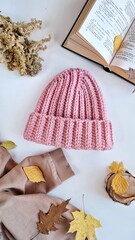 Fashionable knitted hats autumn-winter. The hat lies on a white background. Product layout. Buy a hat. Knitting. Hobby.