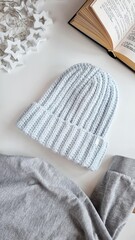 Fashionable knitted hats autumn-winter. The hat lies on a white background. Product layout. Buy a hat. Knitting. Hobby.