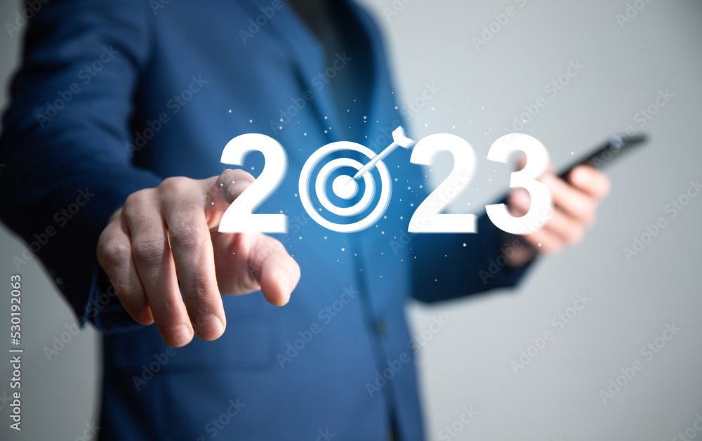 Poster 2023 and target icon on virtual screen.