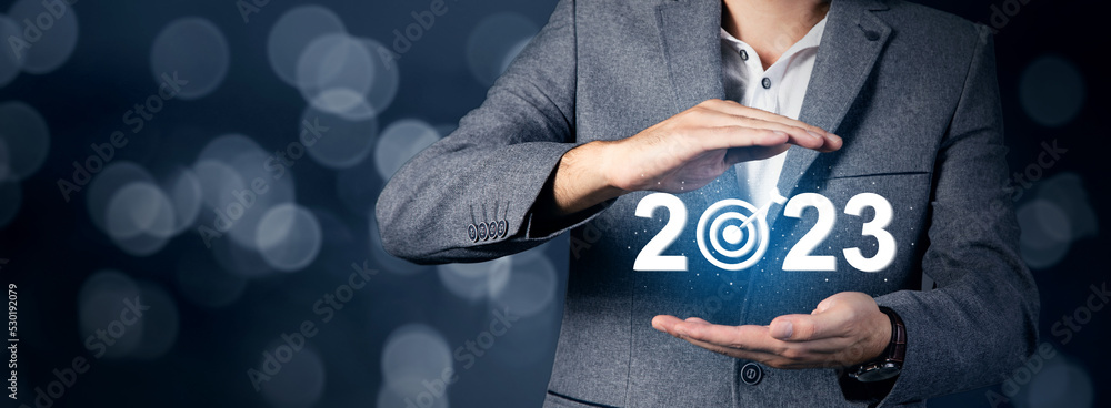 Poster 2023 and target icon on virtual screen.