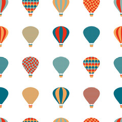 Seamless pattern with hot air balloons fly in the sky. Perfect print for tee, textile, paper and fabric. Retro vector illustration for surface design.