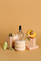 Composition with bottle of essential oil, natural ingredients and decorative stands on color background