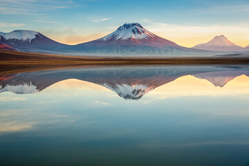 Idyllic Lake Lejia reflection and volcanic landscape in Atacama desert, Chile