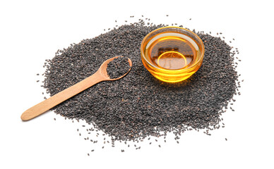 Black sesame seeds and bowl of oil on white background
