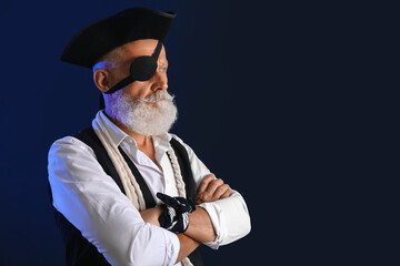 Old pirate with rope on dark background