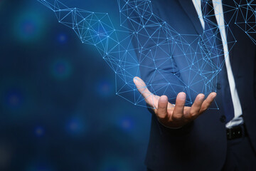 Man and image of virtual connection lines presenting innovation network linkage on dark background