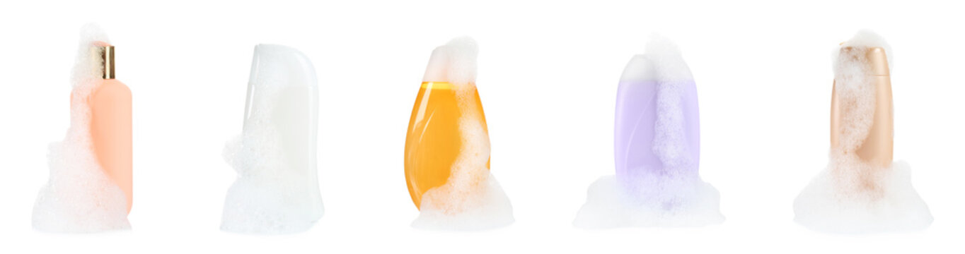 Set with bottles of bubble bath and fluffy foam on white background. Banner design