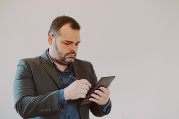 man using tablet computer