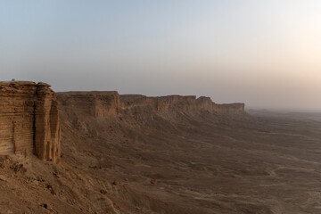 Fototapeta na wymiar the edge of the world near riyadh, saudi arabia at sunset