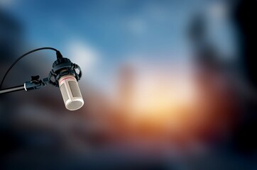 Modern microphone on background for studio podcast and music