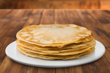 Homemade pancake with oil on white plate. Concept butter pancake.