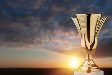 Golden winner trophy on dark sky background