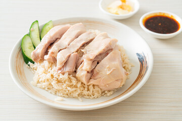 Fototapeta na wymiar Hainanese chicken rice or rice steamed with chicken soup
