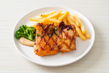 grilled chicken steak with potato chips or french fries