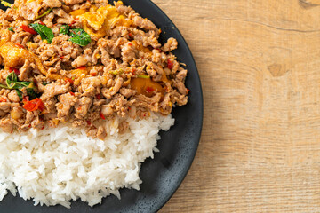 stir-fried minced pork with basil and egg topped on rice