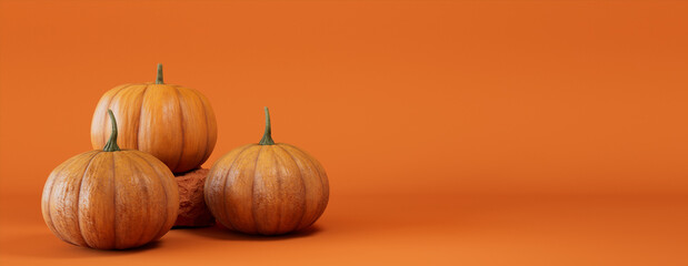 Seasonal background Banner with copy-space. Trio of Pumpkins on Orange color. Fall Concept.