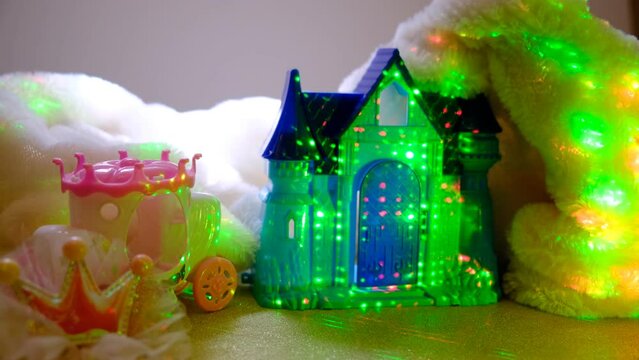 Fairy tale scene. playing room with castle toy, carriage, crown. Fairy home decor, doll house