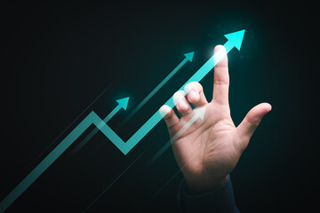Businessman's hand pointing up arrow symbol, business efficiency development and growth concept,...
