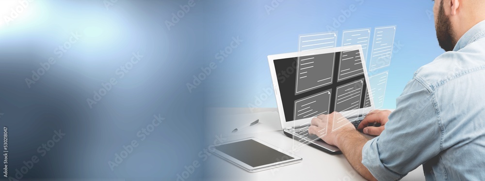 Aufkleber document management system consultant working on laptop computer in office