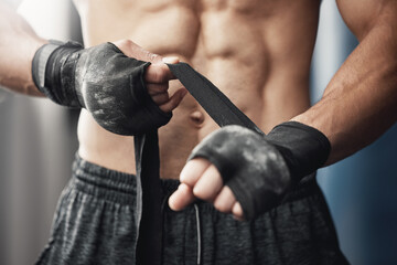 Training, fitness and boxing man prepare for workout or match at gym or fitness center with hand...