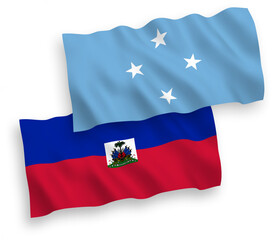 Flags of Federated States of Micronesia and Republic of Haiti on a white background
