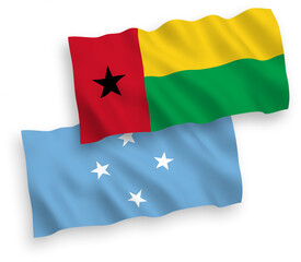 Flags of Federated States of Micronesia and Republic of Guinea Bissau on a white background