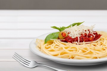 Pasta Spaghetti in plate with sauce, italian cuisine dish.