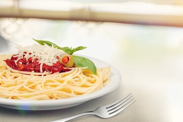 Pasta Spaghetti in plate with sauce, italian cuisine dish.