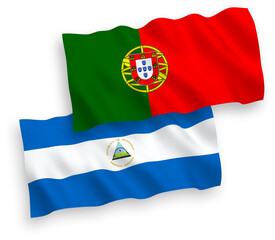 Naklejka premium Flags of Portugal and Nicaragua on a white background