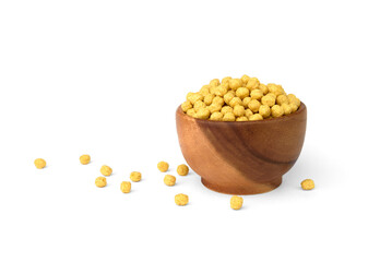 Dried honey balls on wooden bowl isolated on white background.