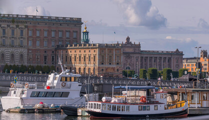 Marooned commuter ferries, the bay Strömmen with the royal castle, museum façade, the parliament...