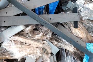 Construction debris and waste close-up. Waste metal is kissed on a construction site.