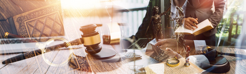 Business and lawyers discussing contract papers with brass scale on desk in office. Law, legal services, advice, justice and law concept picture with film grain effect