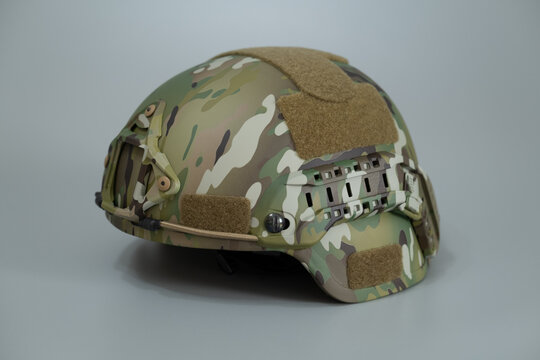 Military protective kevlar helmet to protect the head from bullets and shrapnel. The helmet is painted in multicam color