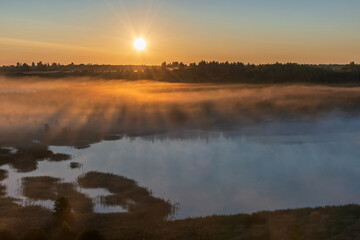 Foggy dawn in Izborsko-Malskaya valley, Pskov region