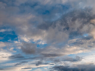 Blue cloudy sky. Nature background for design and sky replacement.