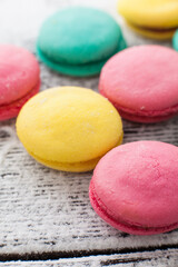 Tasty sweet macarons on a table.