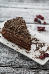 chocolate brown cake and slice on table