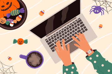 Halloween decorations with person using a laptop. Table with female hands, computer, cup of coffee, pumpkin, spider web and sweets. Flat top view. Colored vector illustration