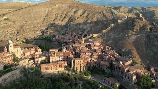 Forward flight view of Albarracin village in Teruel, Spain, one of the most beautiful villages, recorded just afte dawn. 4K
