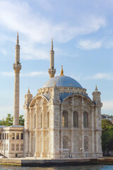 Fototapeta na wymiar Istanbul, Turkey (Turkiye). Ortakoy Mosque on the banks of the Bosphorus on summer day. Amazing masterpiece of Ottoman baroque, XIX century. Turism or history of architecture concept